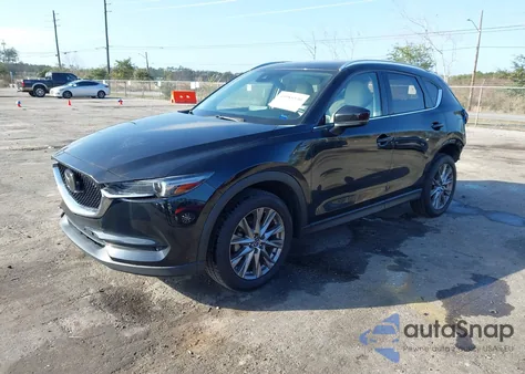 2021 Mazda Cx-5 Grand Touring z USA, uszkodzony, nr VIN JM3KFADM9M0350587